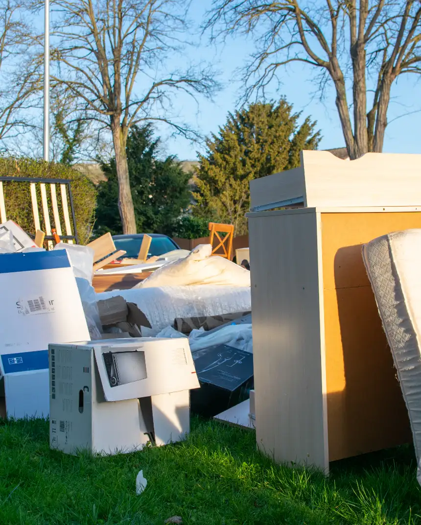Professional team clearing household items and furniture from a residential property